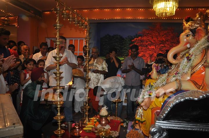 Chef Jolly performs an aarti for Lord Ganesha