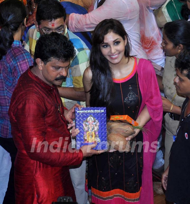 Pooja Chopra with some offerings to the LALBAGHCHA RAJA