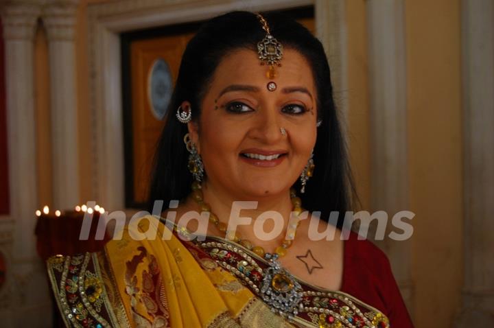 A still image of Apra mehta as Jhumki Bua