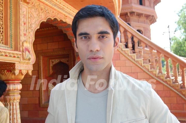 A still image of Kushal Punjabi as Neel