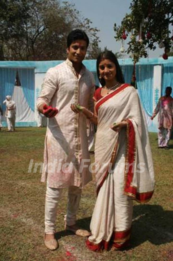 Yudhishtir and Rani playing holi