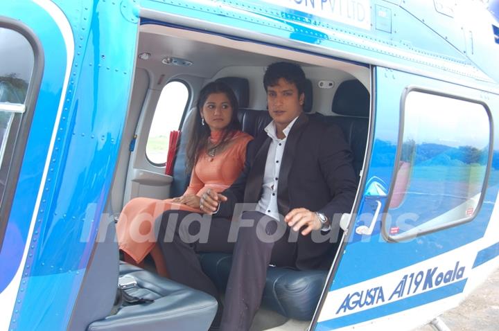 Yudhishtir and Rani sitting on a helicopter