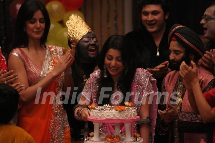 Baby cutting the cake