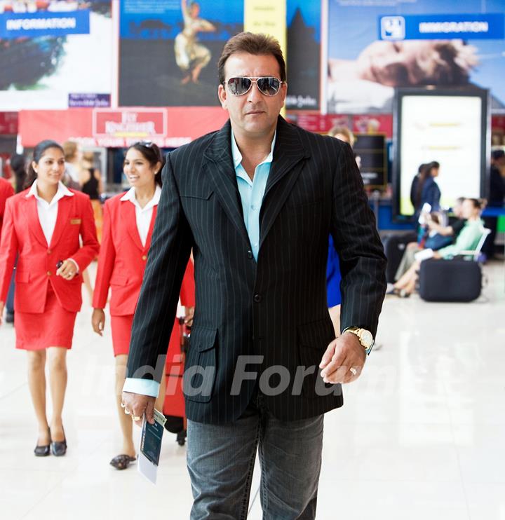 Sanjay Dutt standing on a Airport