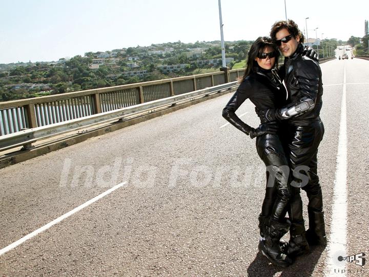 A still image of Vivek Oberoi and Aruna Shields