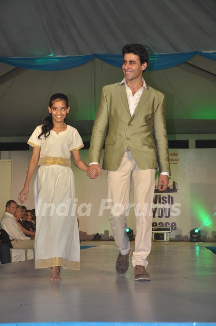 Celebs walk the ramp at the Peace Walk ramp show by designer Rajat Tangri at Welingkar College in Mumbai