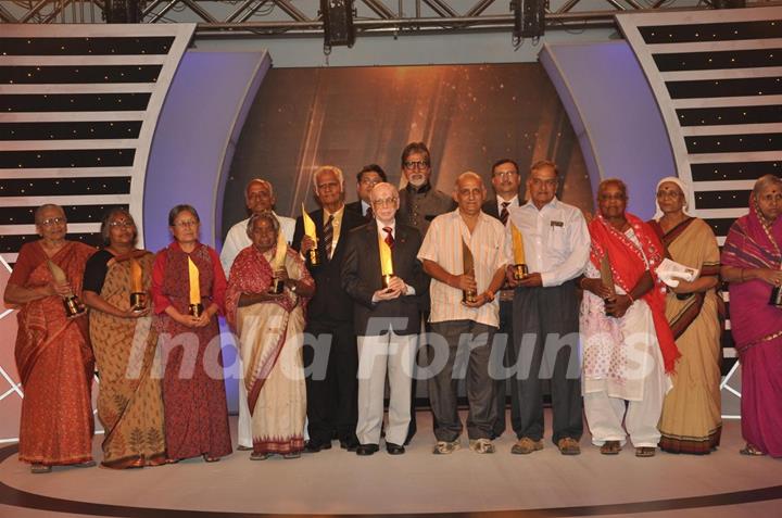 Amitabh Bachchan felicitates a Senior Citizen at the  Awards Ceremony