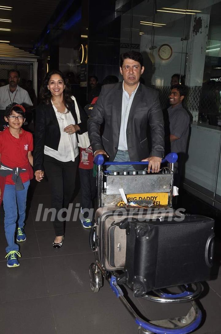 Madhuri Dixit with her family clicked at the airport on 2nd Jan. 2014