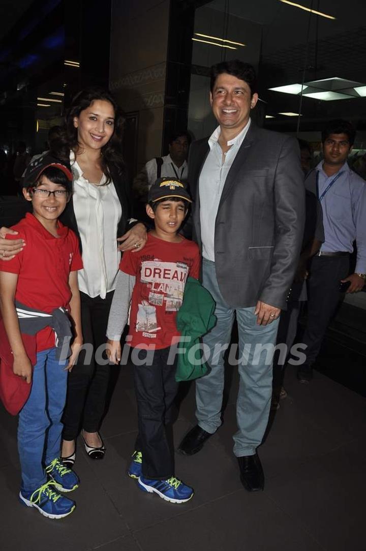 Madhuri Dixit with her family clicked at the airport on 2nd Jan. 2014