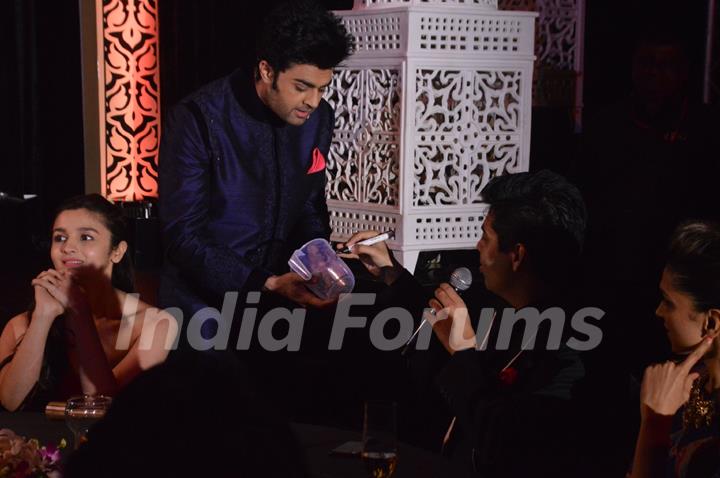 Manish Paul jokes around with Karan Johar at the 59th Idea Filmfare Pre Awards Party