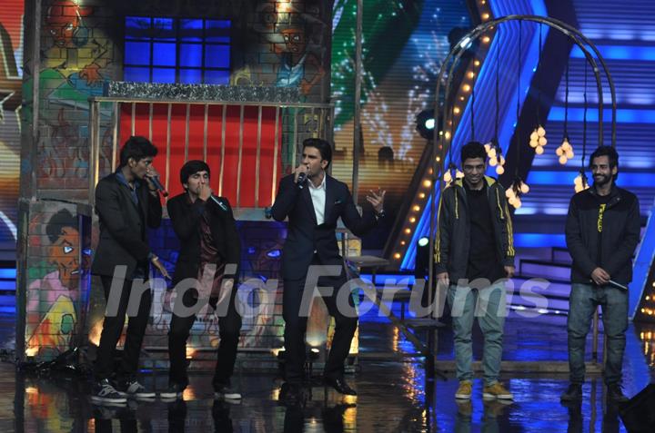 Raveer Singh performs with some contestants