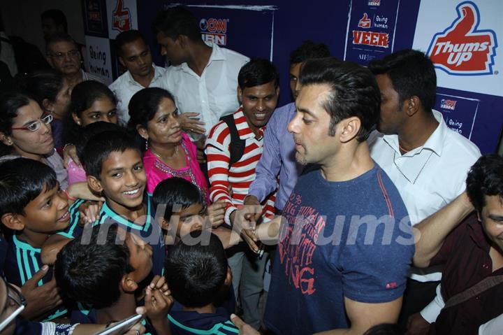 Salman Khan with the children at the launch Thumps Up & Being Human Foundation's Veer Campaign