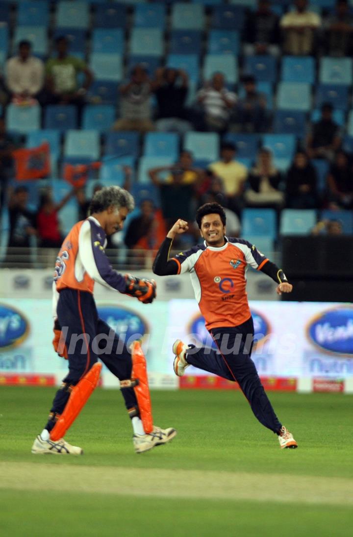 Riteish Deshmukh celebrates after getting a wicket