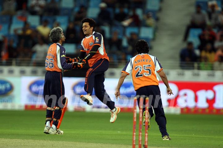 Riteish Deshmukh celebrates after getting a wicket