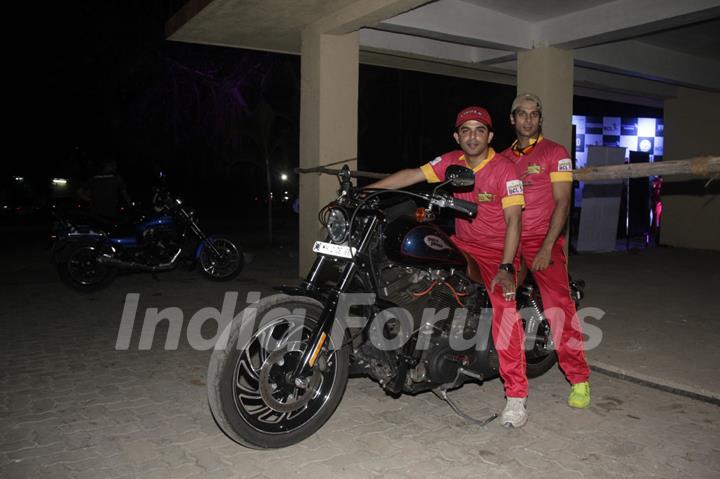 Raj and Karan show off their bike at the Box Cricket league inaugral match