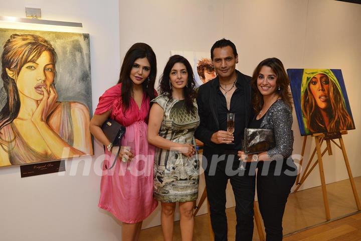 Marc Robionson and Perizaad Zorabian were at Nawaz Modi Singhania's art show