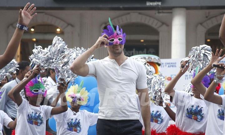 Imran Khan wears a Rio 2 mask