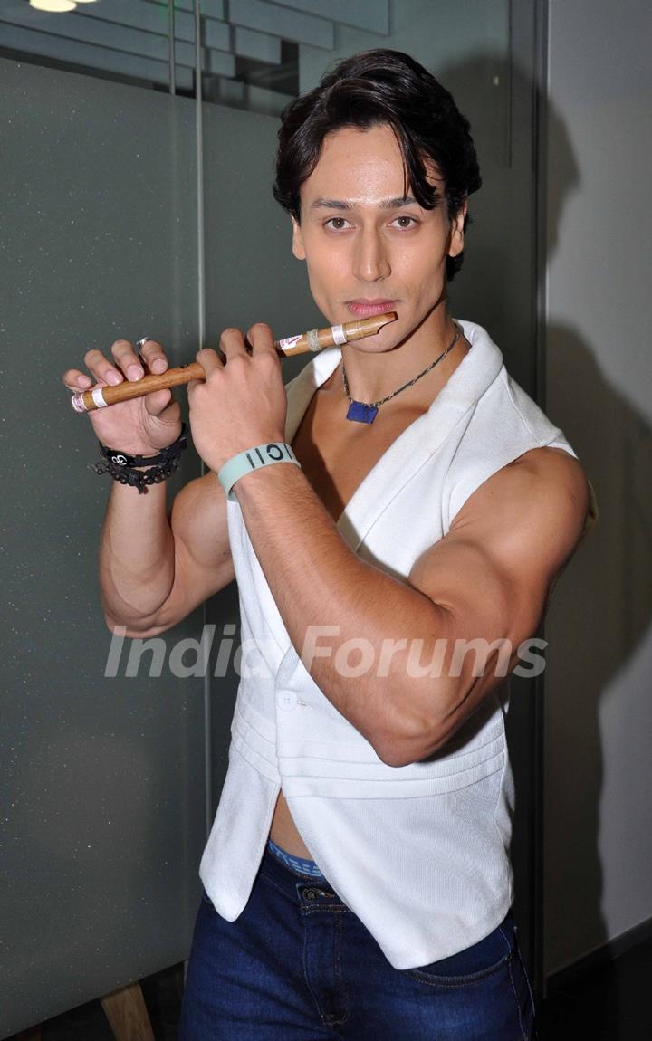 Tiger Shroff poses with a flute at 'Whistle Bajja' song launch