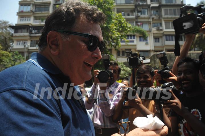 Rishi Kapoor arrives to vote at a polling station in Mumbai