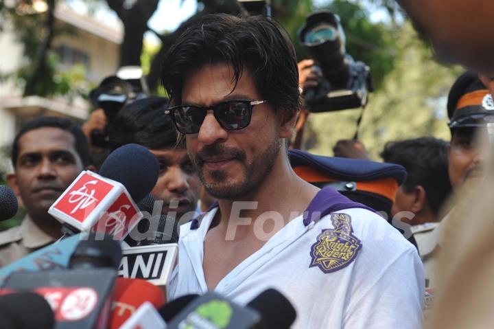 Shahrukh Khan addresses the media at a polling station in Mumbai