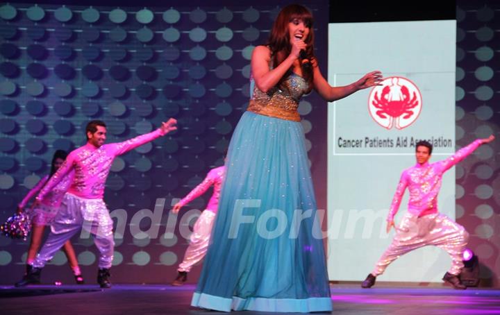 Neeti Mohan performs at the 'Caring with Style' fashion show at NSCI