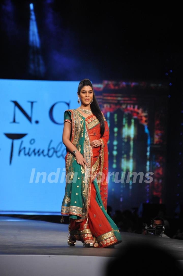 Saakshi Tanwar walked the ramp at the 'Caring with Style' fashion show at NSCI