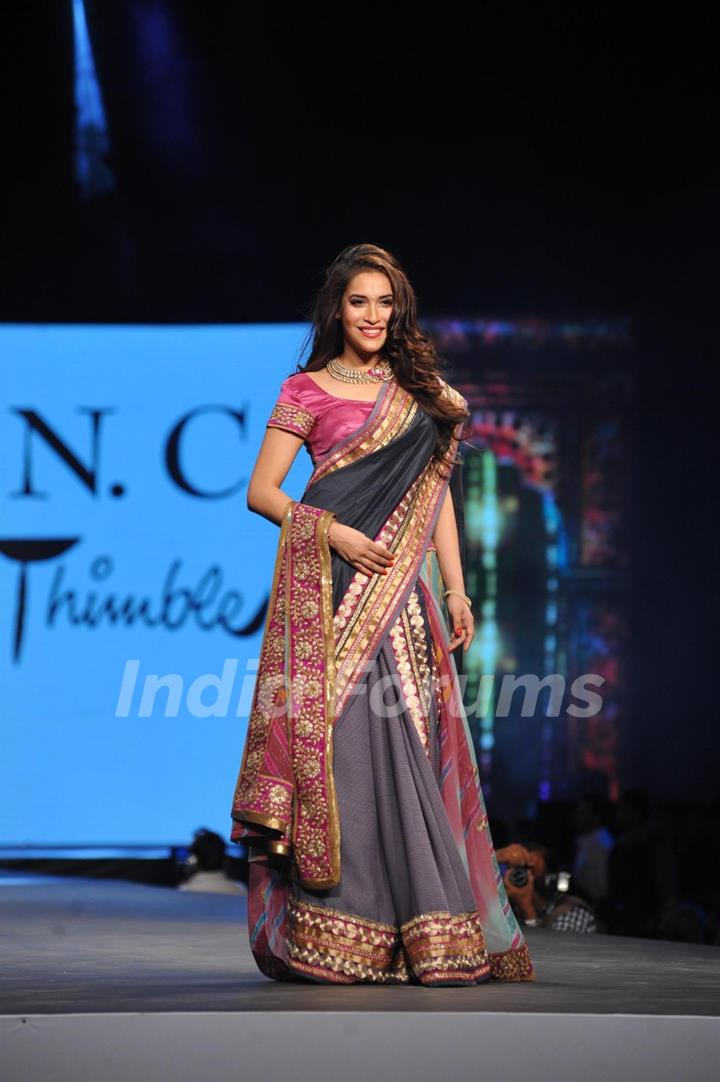 Rashmi Nigam walks the ramp at the 'Caring with Style' fashion show at NSCI