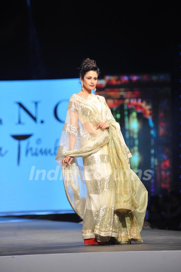 Yuvika Chaudhary walked the ramp at the 'Caring with Style' fashion show at NSCI