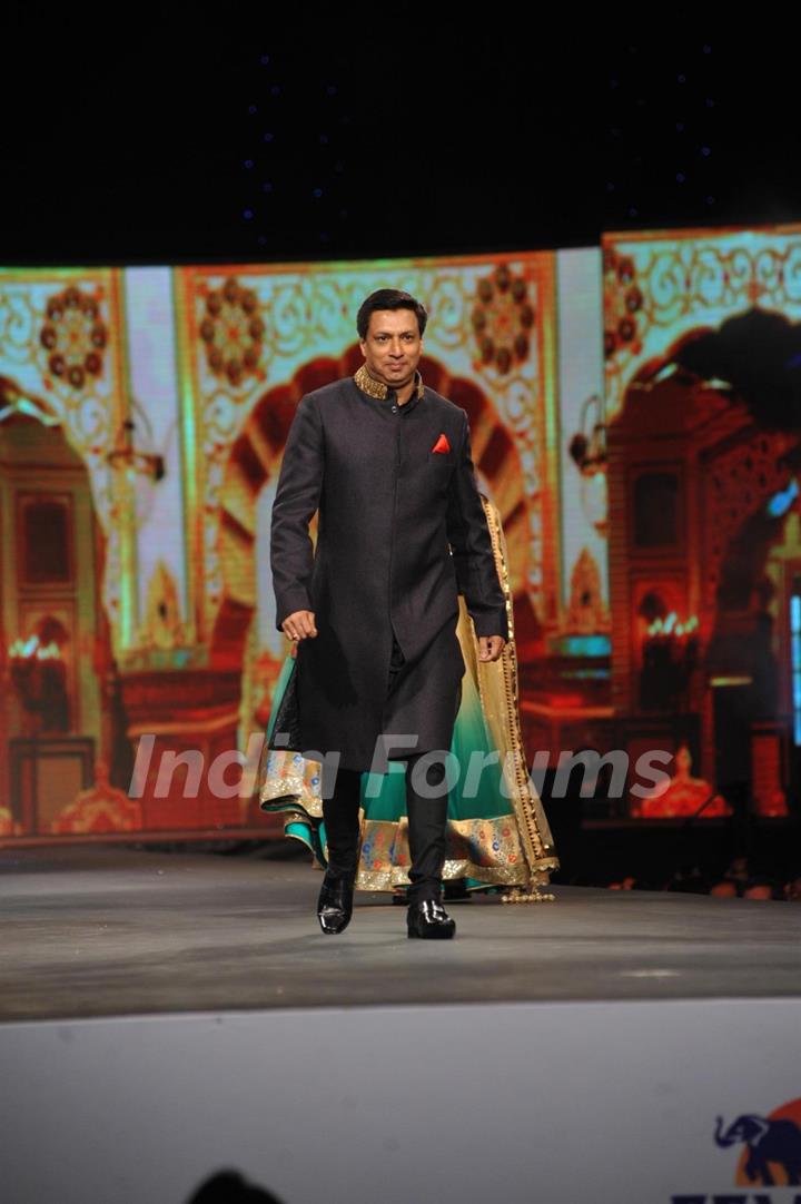 Madhur Bhandarkar walked the ramp at the 'Caring with Style' fashion show at NSCI