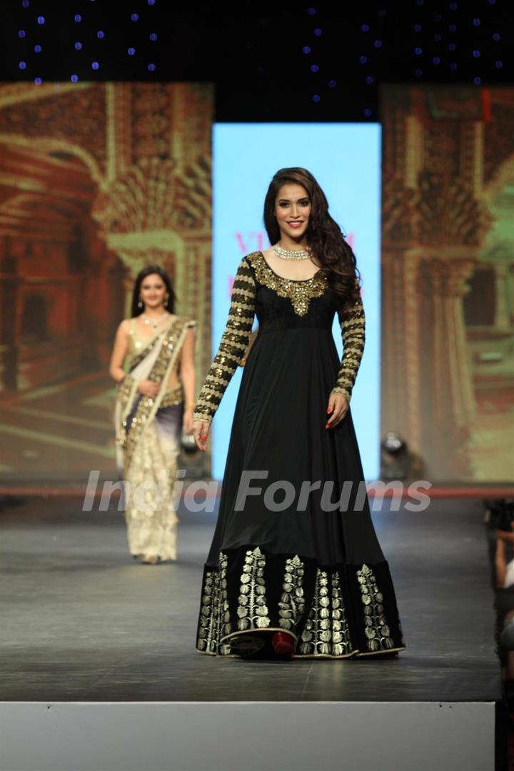 Rashmi Nigam walks the ramp at the 'Caring with Style' fashion show at NSCI