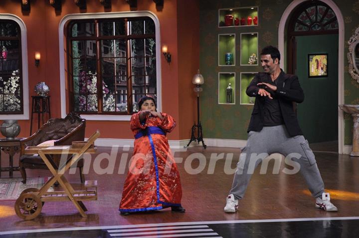 Akshay Kumar performs with Akshat Singh on Comedy Nights With Kapil