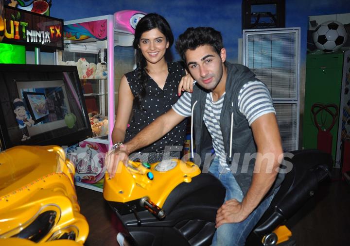 Armaan and Deeksha play a video game at Smaash