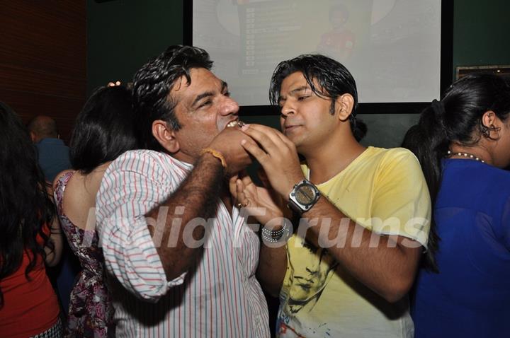 Ankit Tiwari feeding cake to Sujit Tiwari