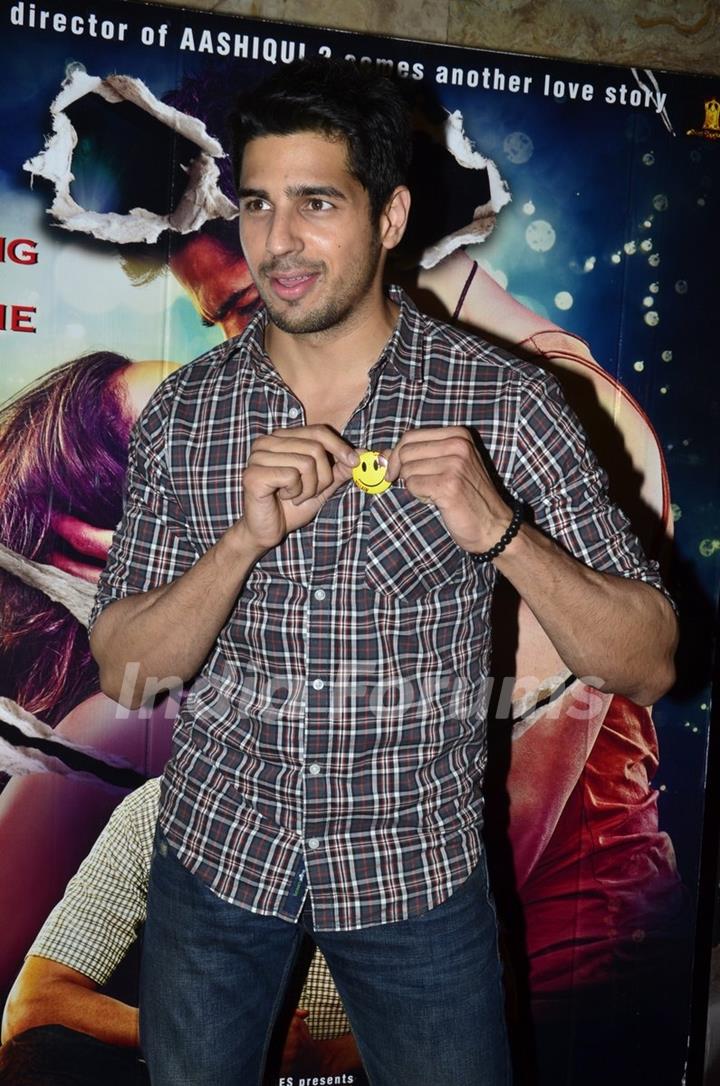 Sidharth Malhotra shows off the Ek Villain smiley at the Screening