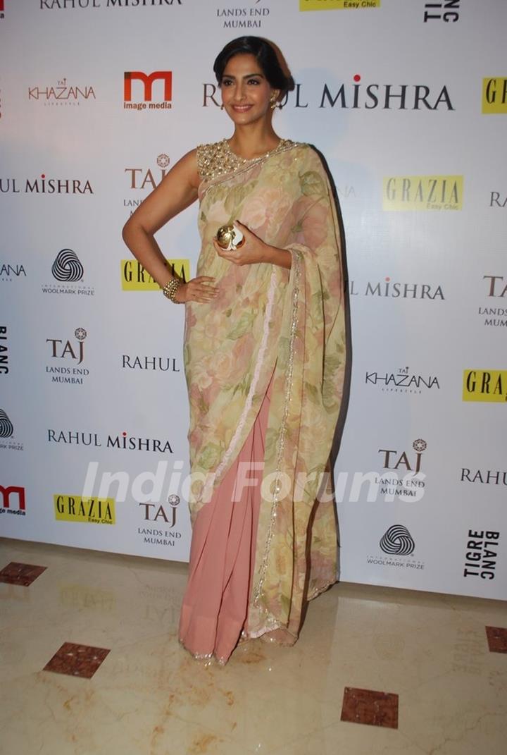 Sonam Kapoor poses for the media at Rahul Mishra's celebration of 6 years in fashion with Grazia