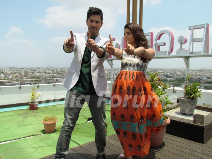 Varun Dhawan and Alia Bhatt strike a pose for the cameras at Ahmedabad