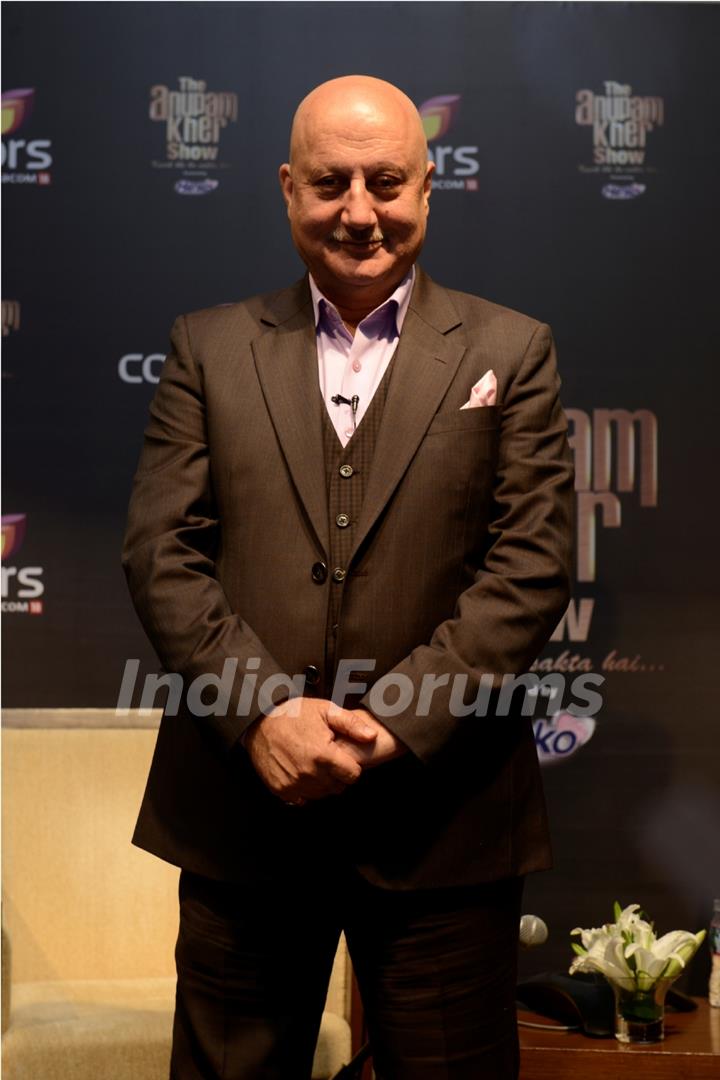 Anupam Kher poses for the Press