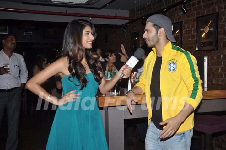 Varun with the anchor of Sony SIX FIFA at Hard Rock Café