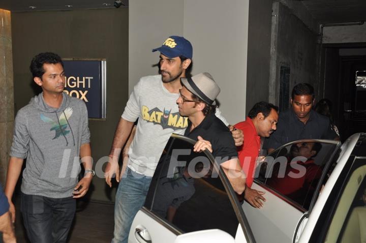 Hrithik Roshan hugs Kunal Kapoor at a screening at Lightbox