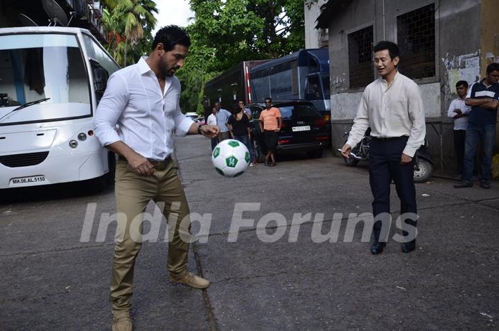 John Abraham playing football with Baichung Bhutia at Castrol Photo Shoot