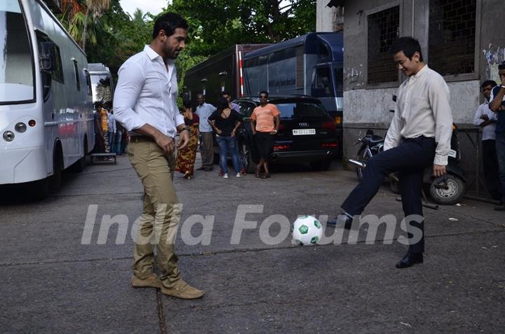 John Abraham playing football with Baichung Bhutia at Castrol Photo Shoot