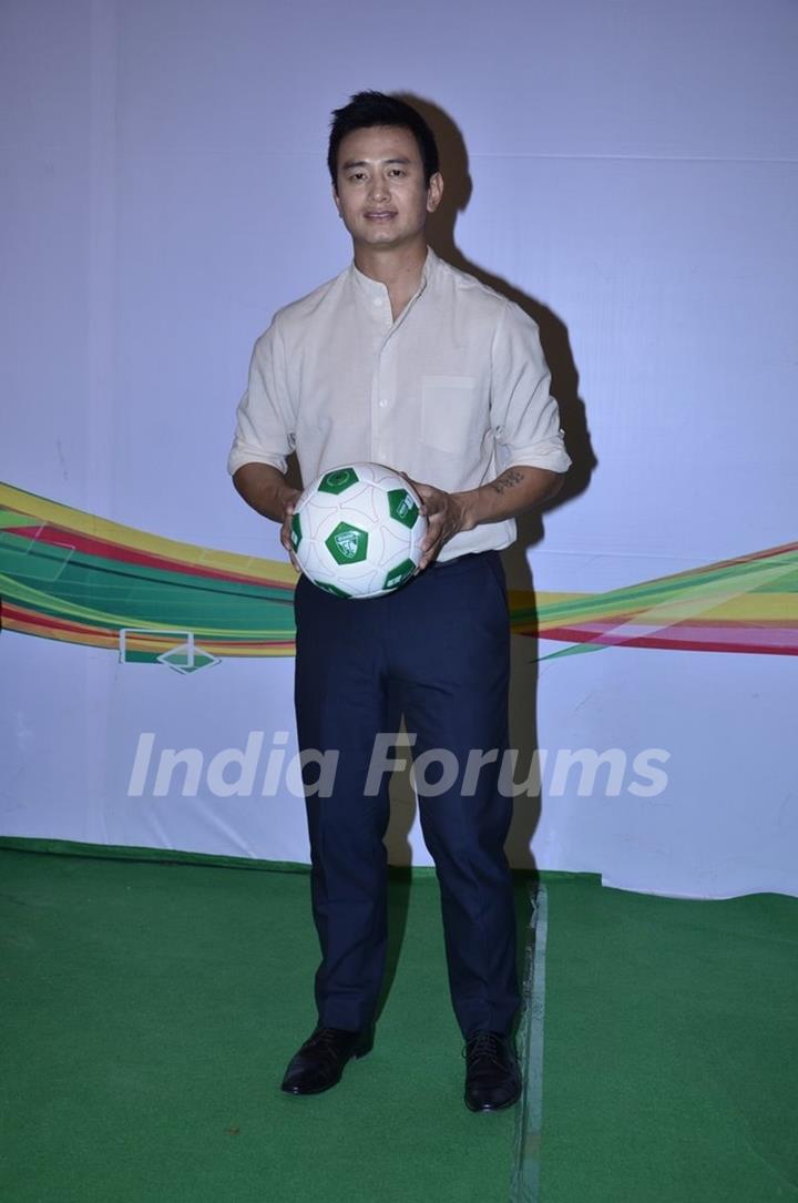 Baichung Bhutia  shows a football trick at Castrol Photo Shoot