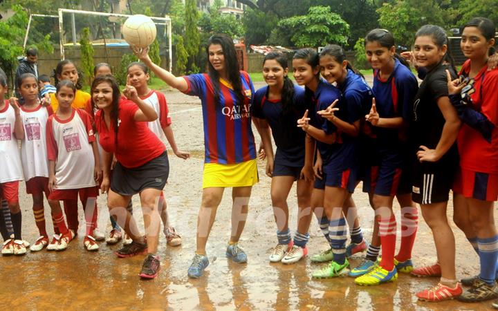 Rakhi Sawant poses with fellow mates at the football match