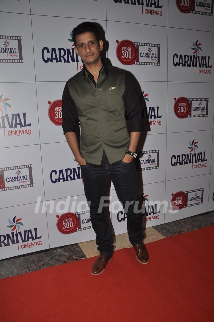 Sharman Joshi poses for the media at the Launch of Carival Cinemas