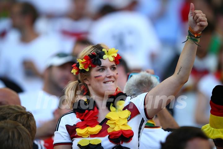 A fan cheering at the FIFA Finale