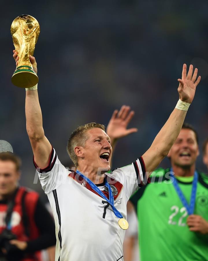 Bastain Schweinsteigerthe with the Trophy at the FIFA Finale