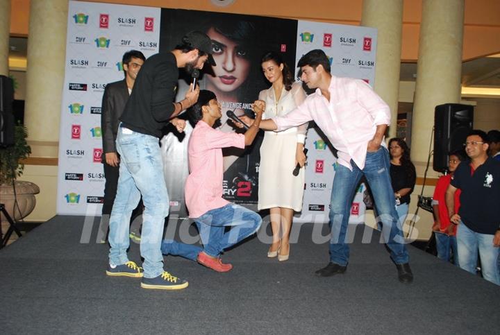 A fan proposes to Surveen Chawla during the Hate Story 2 Promotions