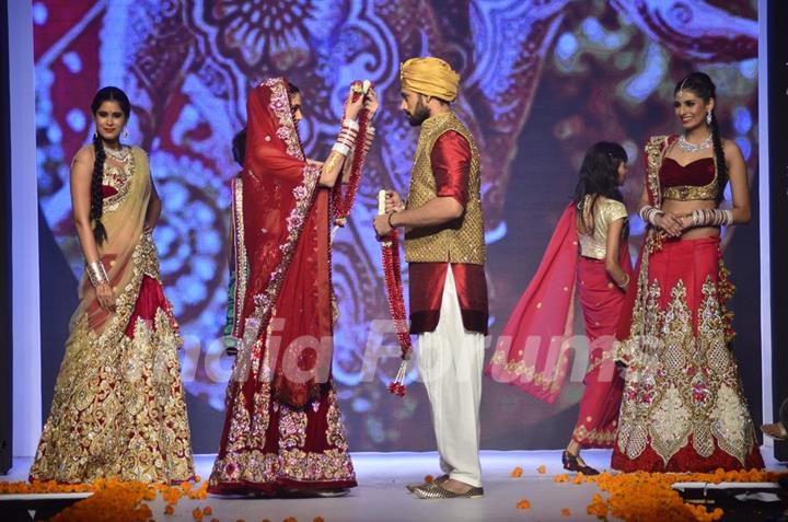 The bride and the groom garland each other at the IIJW 2014 - Day 2