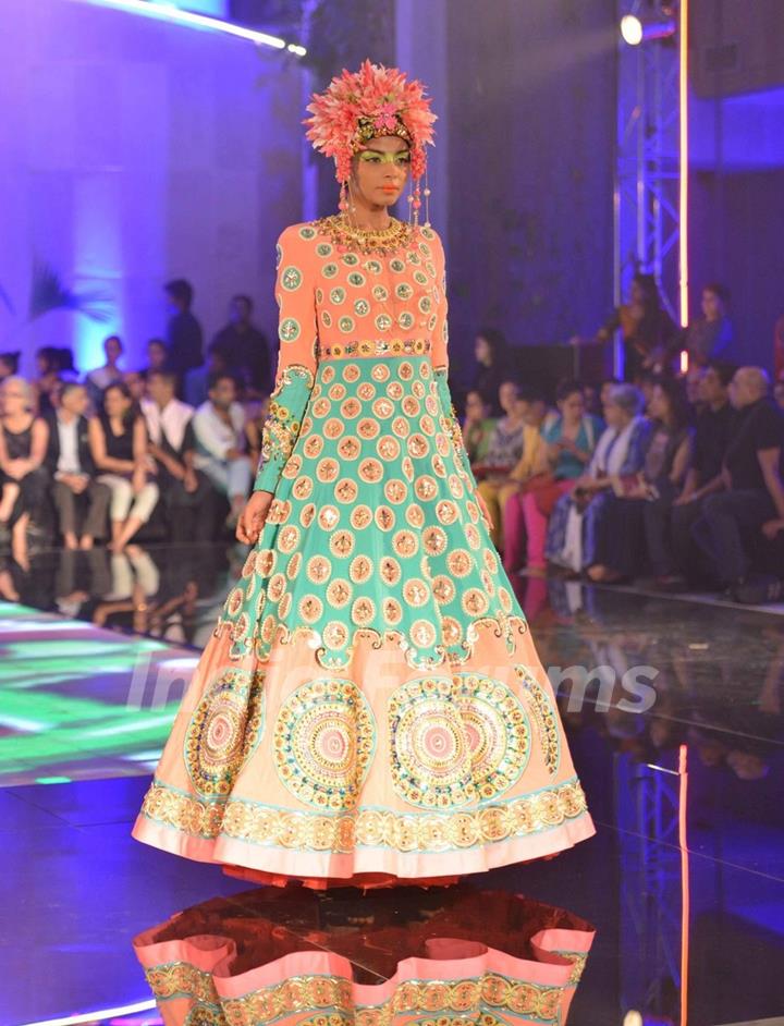 A model walks the ramp at the Indian Couture Week - Day 4