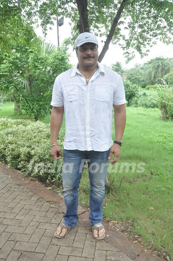 Dayanand Shetty poses for the media at the Tree Plantation Drive